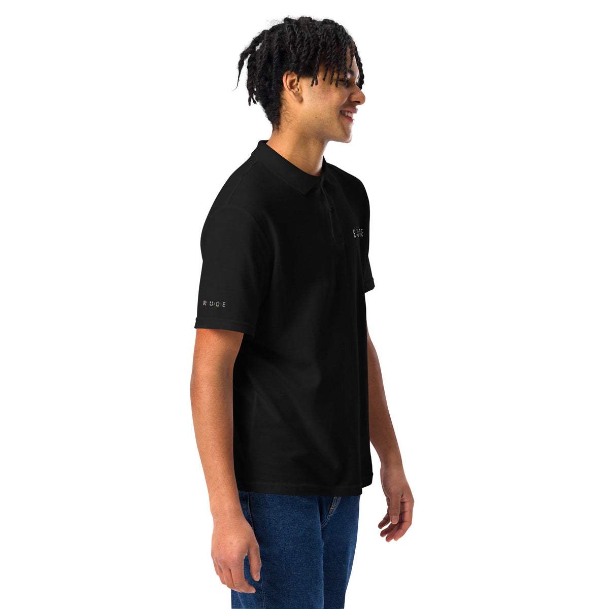 Right-front view of black unisex pique polo shirt with embroidered Rude logo