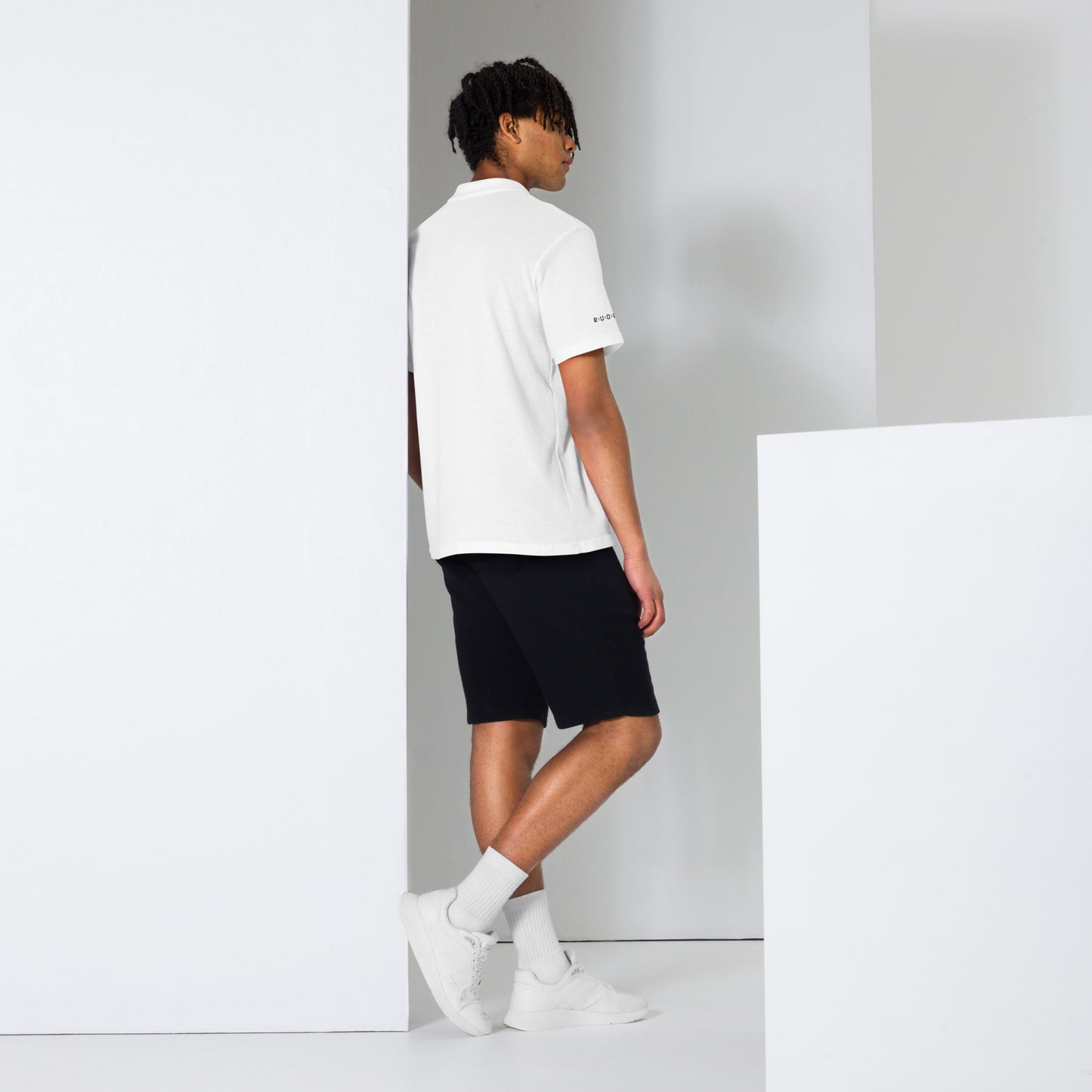 Unisex pique polo shirt in white – premium streetwear polo | Rude Attire
