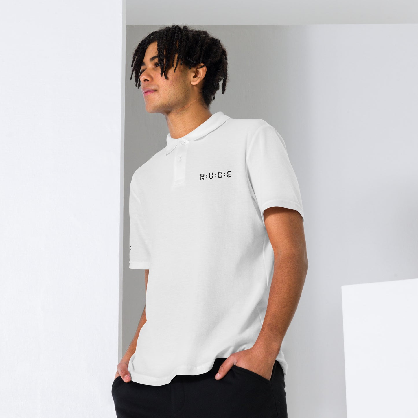 Unisex pique polo shirt in white – premium streetwear polo | Rude Attire