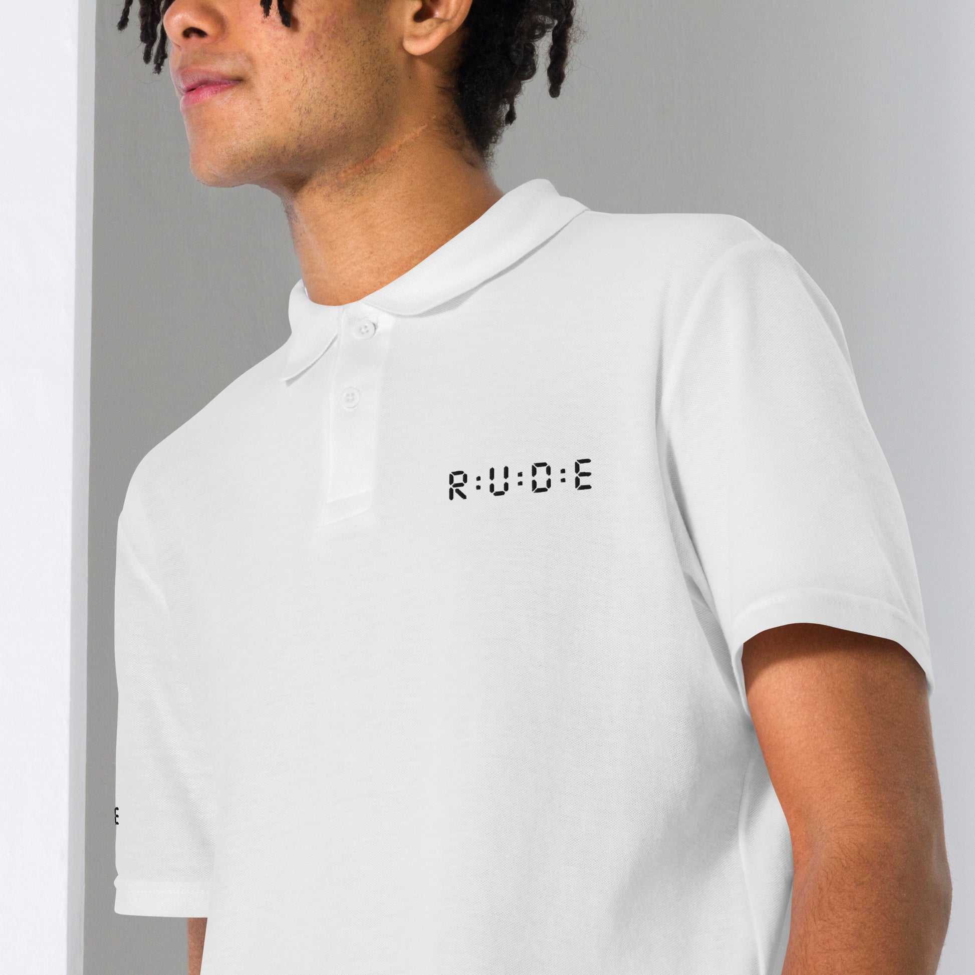 Unisex pique polo shirt in white – premium streetwear polo | Rude Attire